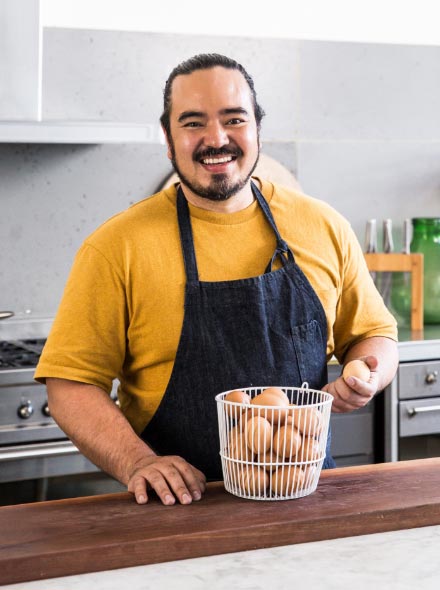 Adam Liew with bowl of eggs